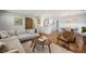 Open-concept layout combining living room and dining area with hardwood floors and stylish furniture at 1089 Greenleaf Se Rd, Atlanta, GA 30316
