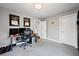 Office room boasts natural light, neutral paint, modern lighting, and a built-in desk for convenient work from home setup at 1089 Greenleaf Se Rd, Atlanta, GA 30316
