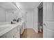 Well-lit bathroom with dual vanity sinks at 1535 Duluth Hwy # 1104, Lawrenceville, GA 30043