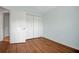 Bedroom featuring closet and hardwood floors at 1535 Duluth Hwy # 1104, Lawrenceville, GA 30043