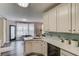 Bright kitchen with quartz countertops, stainless appliances and a bay windowed breakfast nook at 657 Swans Landing Dr, Dacula, GA 30019