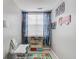 This playroom features Paw Patrol decor and space for schoolwork or other projects at 657 Swans Landing Dr, Dacula, GA 30019