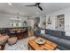 Open concept living room with dining area, wood floors, and comfortable furnishings at 1012 E Paces Chase, Atlanta, GA 30326