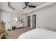 Comfortable bedroom with neutral walls, ceiling fan, and natural light from large windows at 1012 E Paces Chase, Atlanta, GA 30326