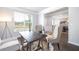 Cozy office space with natural light, stylish chairs, and dark wood desk at 1054 Georgian Point Dr, Lawrenceville, GA 30045