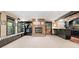 Finished basement features a cozy fireplace, built-in bar, and a charming window seat for added comfort at 221 Streamside Ct, Lilburn, GA 30047