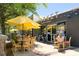 Charming taproom and growler restaurant with outdoor seating under bright yellow umbrellas at 221 Streamside Ct, Lilburn, GA 30047
