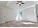 Spacious bedroom with a ceiling fan and two large windows at 3088 Mount Tabor Church Rd, Dallas, GA 30157
