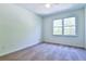 Comfortable carpeted bedroom with a ceiling fan, natural light from a window at 3088 Mount Tabor Church Rd, Dallas, GA 30157