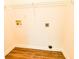 Empty closet featuring wire shelving and laminate flooring at 3088 Mount Tabor Church Rd, Dallas, GA 30157
