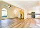 Open living space featuring stairs, hardwood floors, kitchen, and large window at 3088 Mount Tabor Church Rd, Dallas, GA 30157