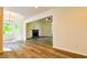 Spacious living room showcasing a fireplace and large windows offering plenty of natural light at 3088 Mount Tabor Church Rd, Dallas, GA 30157