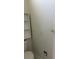 Bathroom featuring a toilet, built-in shelving, and a towel rack for added storage at 311 Indus Ln, Lawrenceville, GA 30044