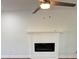 Living room showcasing a modern fireplace with a white mantel and sleek design at 311 Indus Ln, Lawrenceville, GA 30044