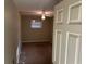 Modest bedroom with ceiling fan and window offering natural light and neutral walls at 520 Pine Dr, Pine Lake, GA 30072