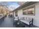 Spacious back porch with outdoor seating, ideal for entertaining and enjoying the backyard view at 777 Forrest Nw St, Atlanta, GA 30318