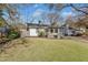 Lovely home with inviting front porch, neat landscaping, and a serene neighborhood setting at 777 Forrest Nw St, Atlanta, GA 30318