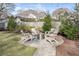 Beautiful backyard fire pit and seating area with pavers and attractive landscaping at 777 Forrest Nw St, Atlanta, GA 30318
