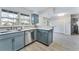 This modern kitchen offers stainless steel appliances and a view to the back yard at 777 Forrest Nw St, Atlanta, GA 30318