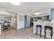 Open concept kitchen with breakfast bar overlooking the dining area at 777 Forrest Nw St, Atlanta, GA 30318
