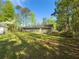A large yard with a storage shed near the house at 175 Stoneview Cir, Covington, GA 30016