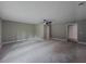 Spacious bedroom features a modern ceiling fan and plush carpeting at 175 Stoneview Cir, Covington, GA 30016