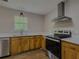 Bright kitchen with modern appliances, updated countertops and modern lighting at 175 Stoneview Cir, Covington, GA 30016
