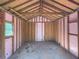 Empty backyard shed interior, a blank canvas ready to be adapted to your needs, storage or workshop at 175 Stoneview Cir, Covington, GA 30016