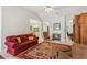 Inviting living room with fireplace, comfortable seating, and neutral color palette at 2265 Pemberton Pt, Buford, GA 30519
