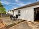 Home featuring backyard deck with seating area and manicured lawn at 2329 Wavetree Nw Ln, Acworth, GA 30101