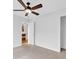 Bright bedroom featuring plush carpeting and a ceiling fan at 2329 Wavetree Nw Ln, Acworth, GA 30101