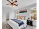 Welcoming bedroom filled with natural light featuring two windows and ensuite at 2329 Wavetree Nw Ln, Acworth, GA 30101