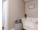 Bright bathroom features a soaking tub, decorative stool, and neutral wall color at 3805 Forsythia Way, Douglasville, GA 30135