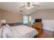 A cozy bedroom features hardwood floors, a vaulted ceiling, and plenty of natural light at 3805 Forsythia Way, Douglasville, GA 30135