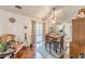 Functional dining area with hardwood floors and view to both the living room and kitchen at 3805 Forsythia Way, Douglasville, GA 30135
