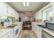 Bright eat-in kitchen featuring an open layout into dining and living area at 3805 Forsythia Way, Douglasville, GA 30135