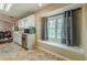 Open eat-in kitchen with a sun-filled window at 3805 Forsythia Way, Douglasville, GA 30135