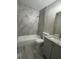 Modern bathroom with stylish shower tile, vanity, and fixtures at 4049 Heritage Valley Ct, Norcross, GA 30093