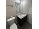 Updated bathroom with granite countertop, tile backsplash, and new fixtures at 4049 Heritage Valley Ct, Norcross, GA 30093
