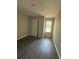 Well-lit bedroom featuring hardwood-style floors and neutral walls, creating a serene atmosphere at 4049 Heritage Valley Ct, Norcross, GA 30093