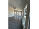 Bright living room featuring modern ceiling fan and multiple windows at 4049 Heritage Valley Ct, Norcross, GA 30093