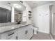 Bathroom featuring granite counters, vanity, and glass shower at 860 Peachtree Ne St # 2118, Atlanta, GA 30308
