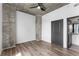 Bedroom featuring hardwood floors and ensuite bathroom at 860 Peachtree Ne St # 2118, Atlanta, GA 30308