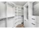 Walk-in closet featuring custom shelving and plenty of storage space at 860 Peachtree Ne St # 2118, Atlanta, GA 30308