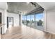 Bright, open living room with floor-to-ceiling windows and stunning city views at 860 Peachtree Ne St # 2118, Atlanta, GA 30308