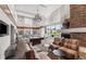 Relaxing resident lounge features ample seating, pool table, and fireplace, perfect for socializing at 860 Peachtree Ne St # 2118, Atlanta, GA 30308