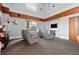 A modern media room is designed for entertainment, featuring comfortable seating and a large screen for viewing at 860 Peachtree Ne St # 2118, Atlanta, GA 30308