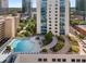 Rooftop pool and garden area with lounge chairs provides an exclusive escape and city views at 860 Peachtree Ne St # 2118, Atlanta, GA 30308