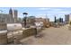 Grilling area on the rooftop terrace with multiple grills and seating for entertaining at 860 Peachtree Ne St # 2118, Atlanta, GA 30308