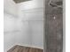 Bright walk-in closet featuring wire shelving for optimal storage and wood-look flooring at 860 Peachtree Ne St # 2118, Atlanta, GA 30308